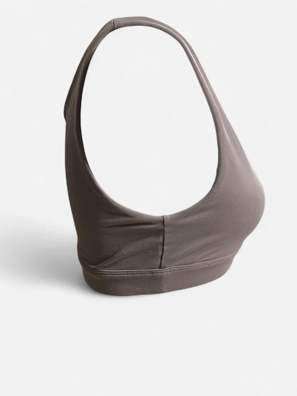 ALO Yoga Peak Sports Bra in Taupe.